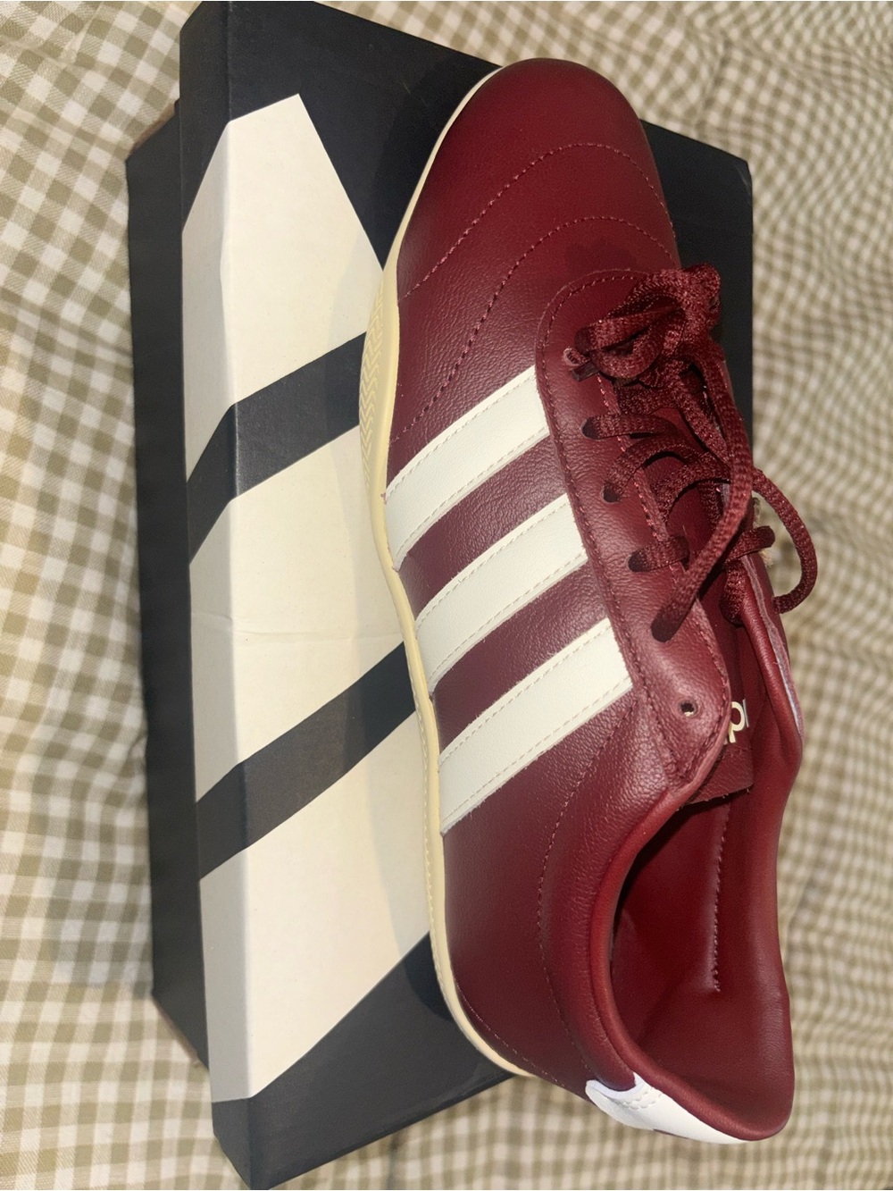 adidas women’s Burgundy Sneakers with White Stripes